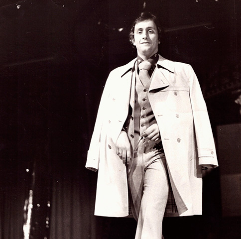 Brent Sadler sporting rainwear during a fashion show in Reading, Berkshire, UK during the 1970s