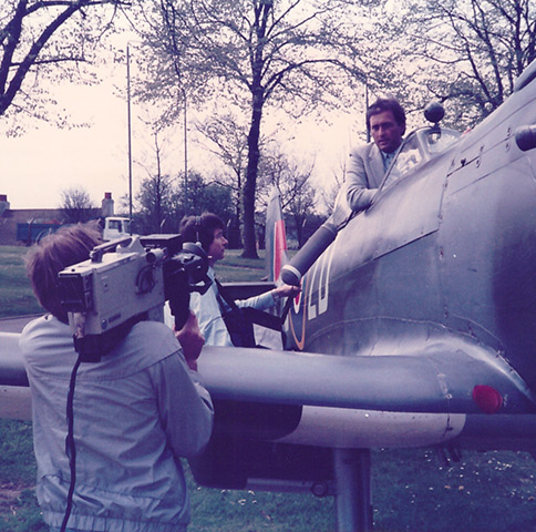 Brent Sadler recording a stand-up for ITN before taking to the skies in a two-seater Spitfire