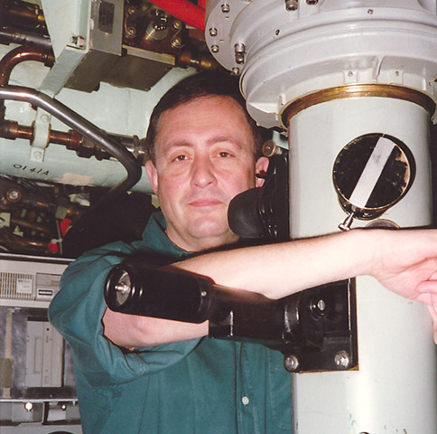 Brent Sadler at the periscope of the US nuclear submarine, Archerfish, on patrol in the Mediterranean